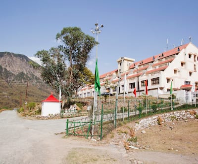 https://imgcld.yatra.com/ytimages/image/upload/t_hotel_yatra_city_desktop/v1391037439/Domestic Hotels/Hotels_Nainital/Hotel Dynasty Resort/Facade~240.jpg